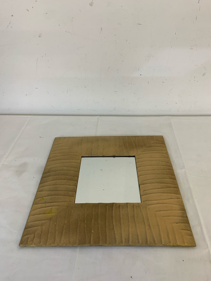 TEXTURED TAN SQUARE METAL MIRROR.