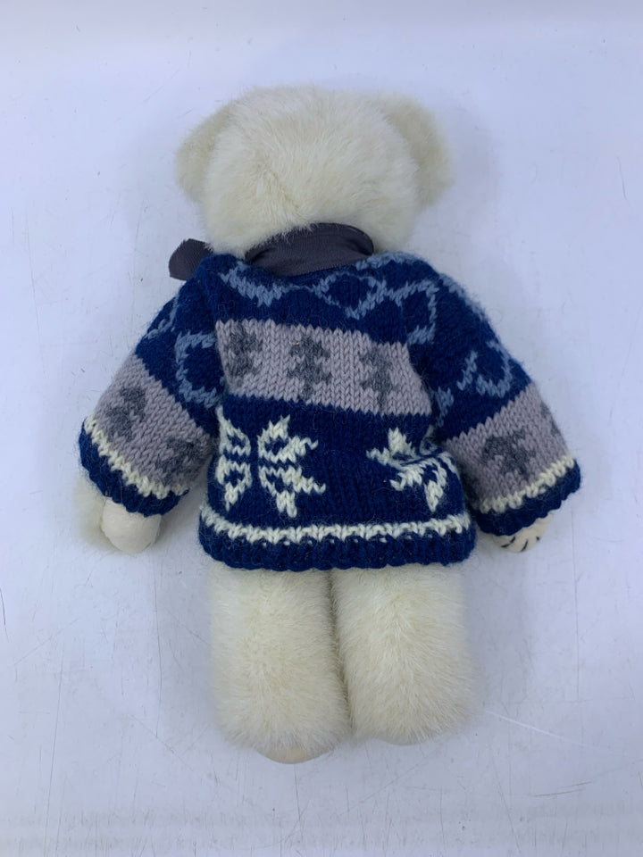 WHITE BEAR W/ SNOWFLAKE SWEATER ON.