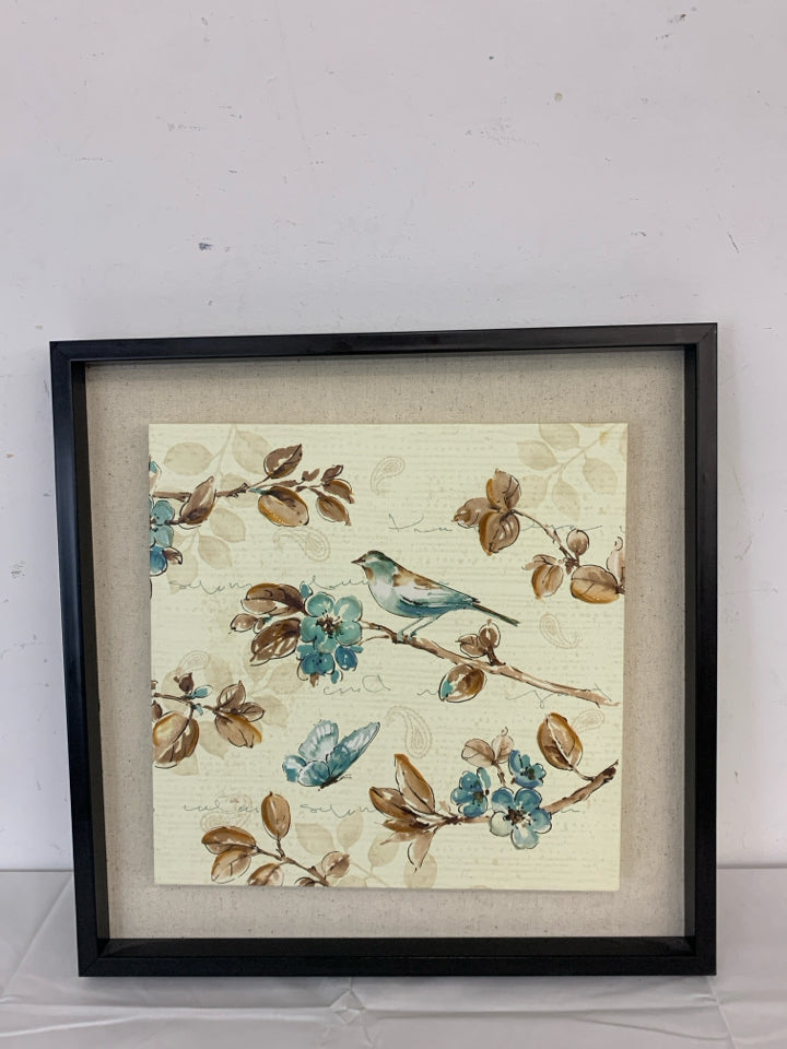 BIRD CANVAS ON DARK WOOD FRAME.