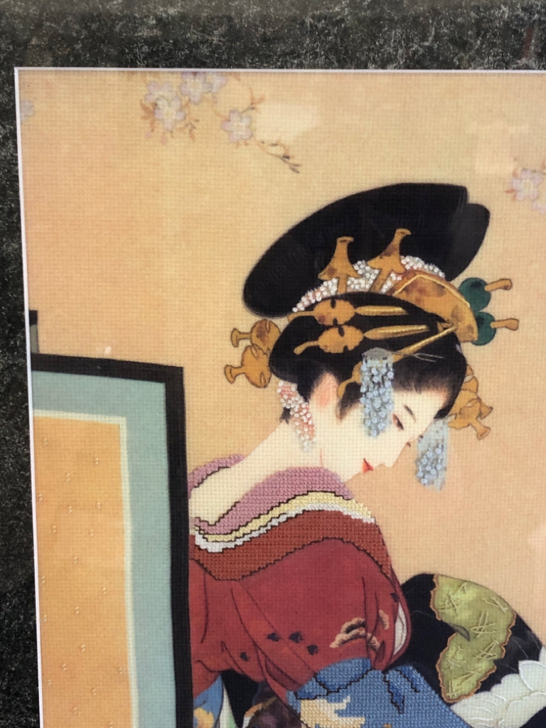 EMBROIDERED GEISHA WOMAN HOLDING BLANKETS FRAMED PRINT.