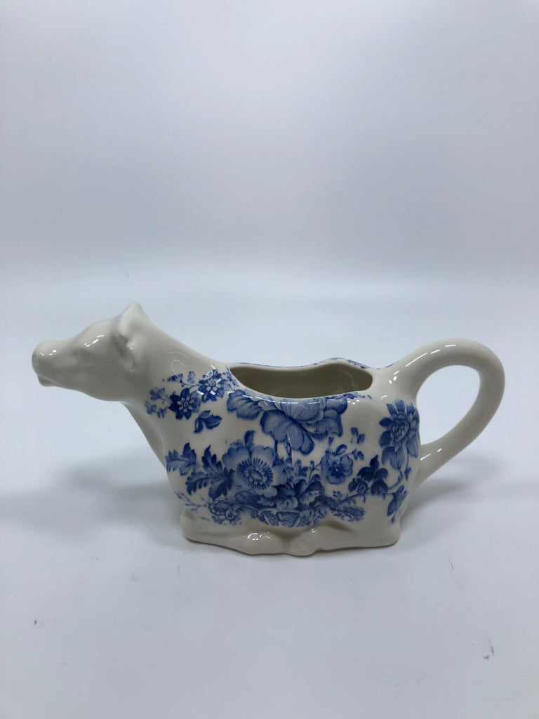 VTG CROWN DEVON WHITE CREAM COW W/BLUE FLORAL DESIGN.