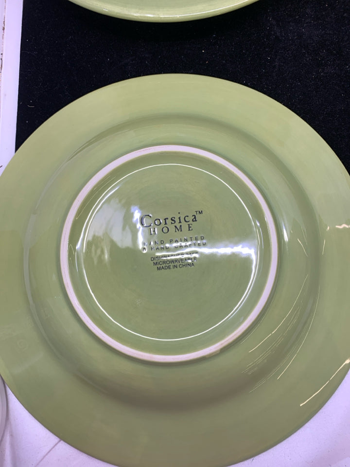4 GREEN DINNER PLATES.
