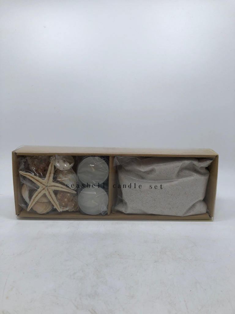 NIB SEASHELL CANDLE SET.