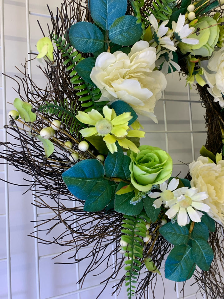 WHITE AND GREEN FLORAL WREATH.