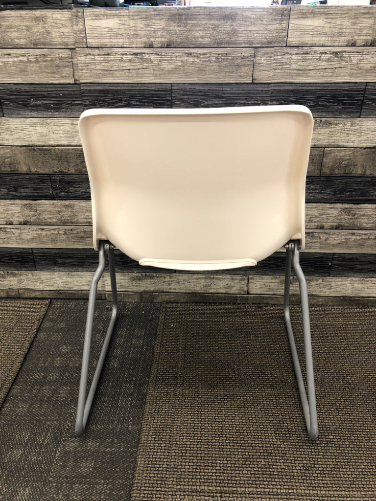 IKEA WHITE PLASTIC CHAIR W/METAL LEGS.