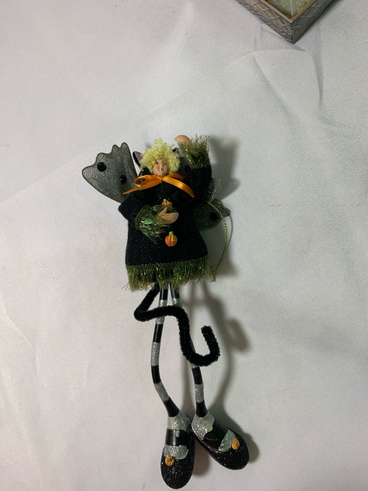 BLONDE GIRL DRESSED AS BLACK CAT HALLOWEEN ORNAMENT.