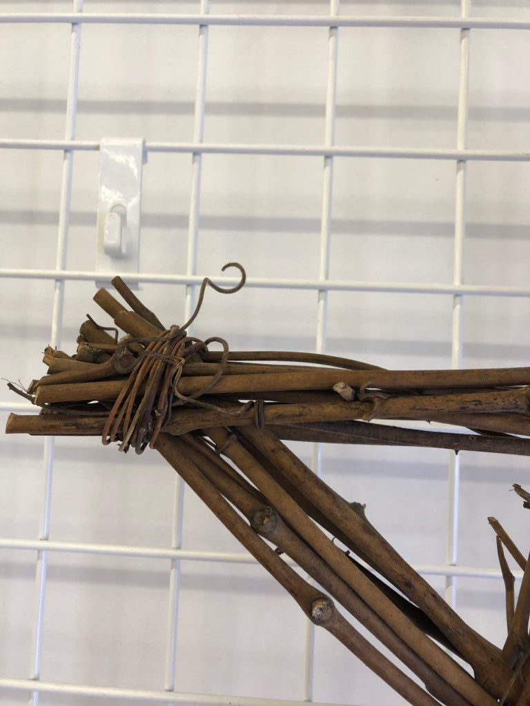 TWIG STAR SHAPED WALL HANGING.
