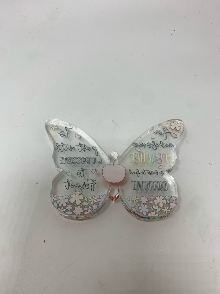 "TEACHER" BUTTERFLY FIGURINE IN BAG.