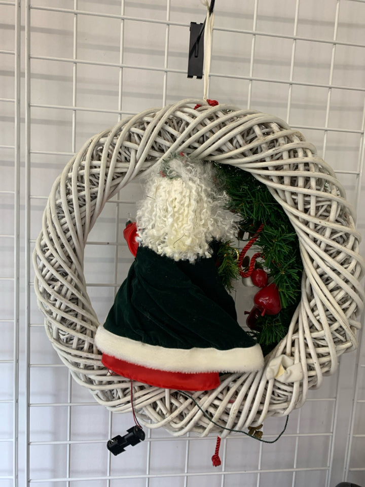 WHITE TWIG WREATH W SANTA CENTER WITH LIGHTS & MUSIC.