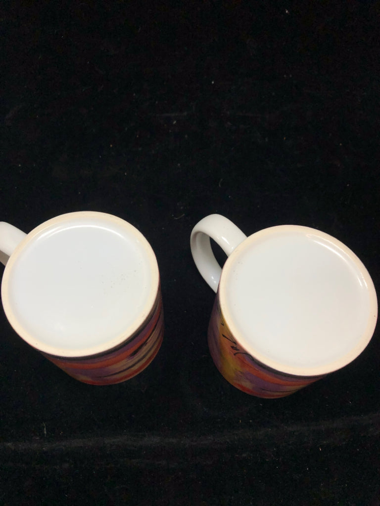 2 ABSTRACT PRINTED MUGS.