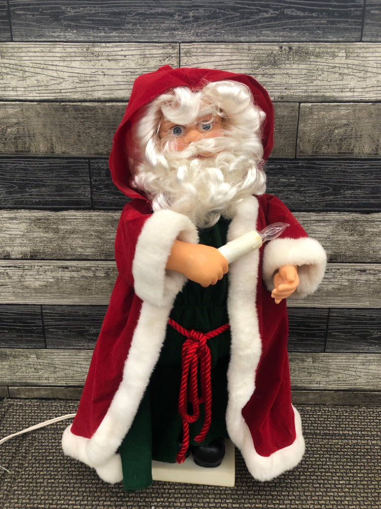 MOVING SANTA CLAUS W/ LIGHT UP CANDLE.