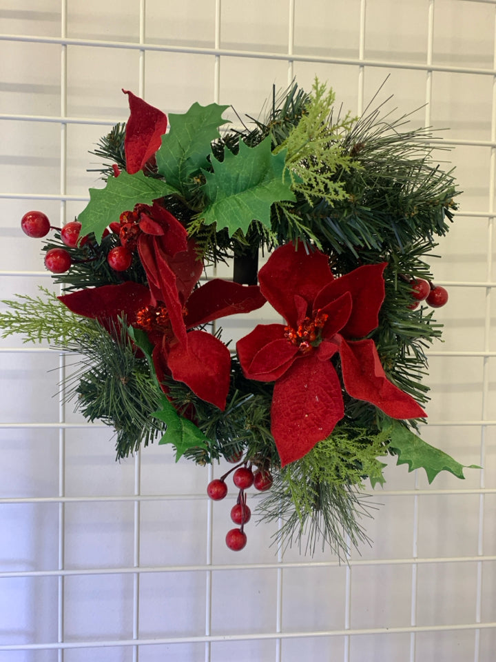 SMALL POINSETTIA W PINECONE WREATH.