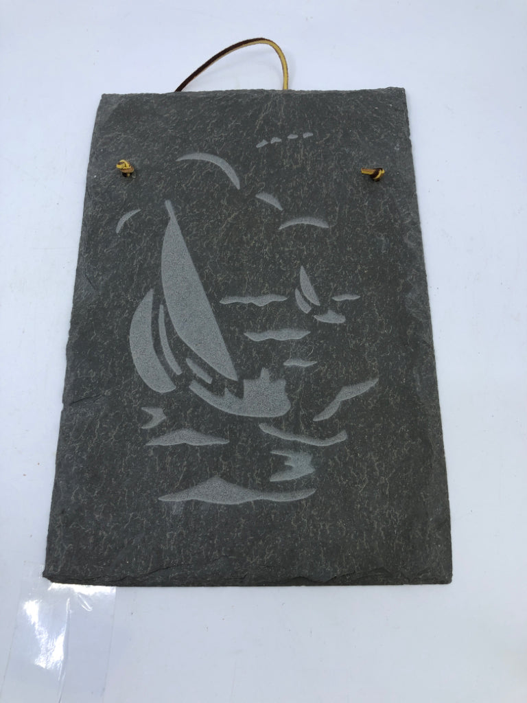 CARVED SAILBOAT ON SLATE.