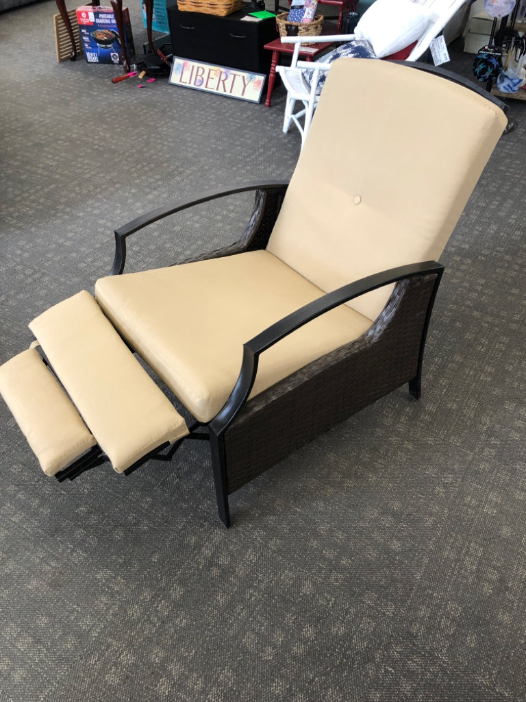 RECLINING PATIO CHAIR W/TAN CUSHION BROWN FRAME.