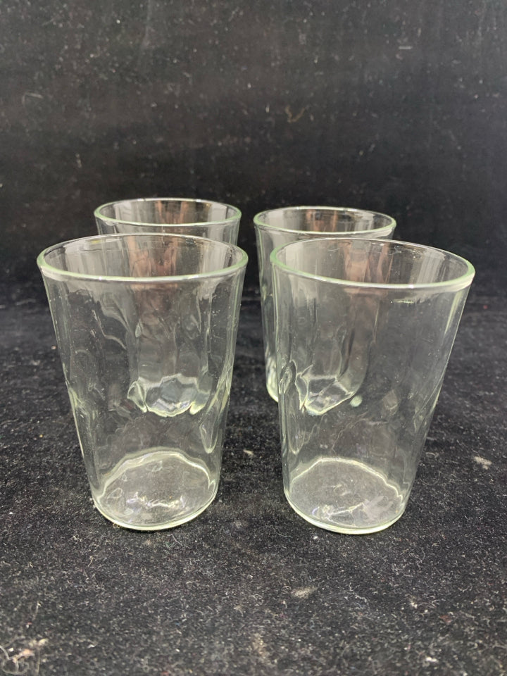 4 SLIGHTLY RIBBED JUICE GLASSES.