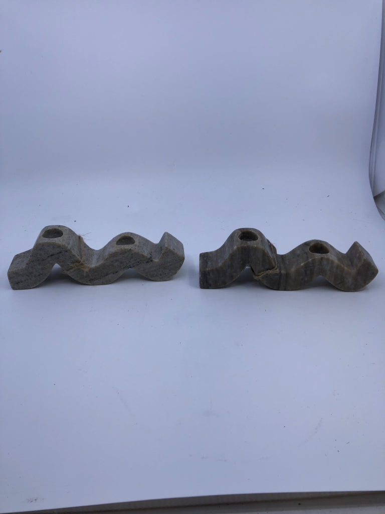2 STONE WAVY TAPER CANDLE HOLDERS.