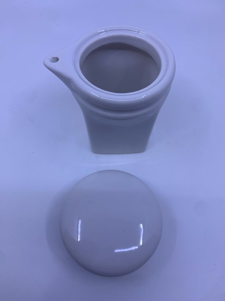 CREAMER CANISTER WITH SPOUT AND LID.