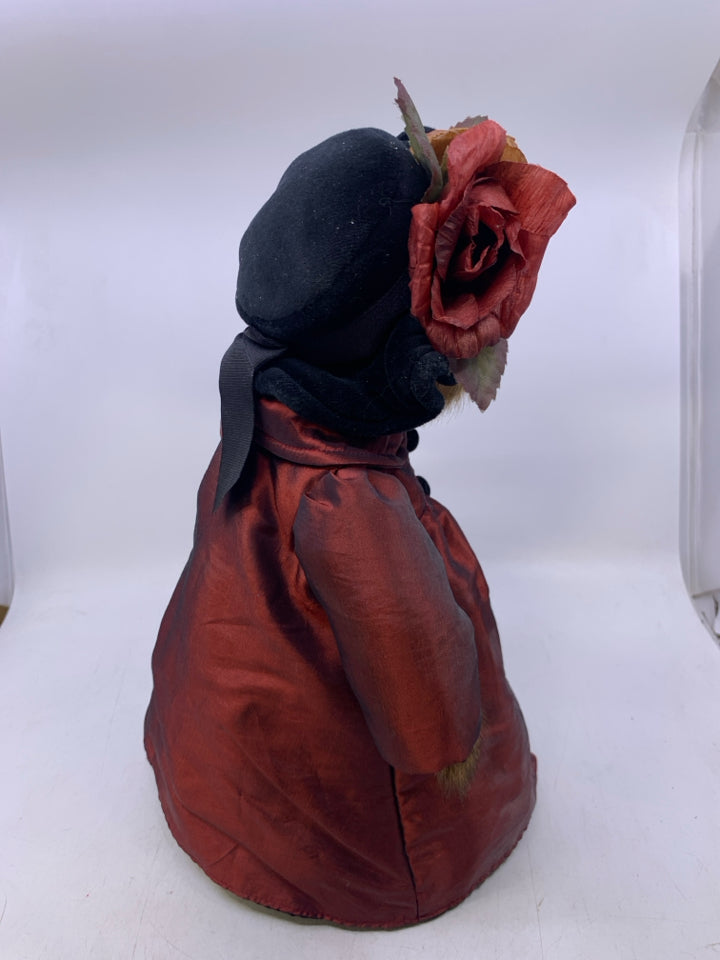 BEAR IN MAROON JACKET, BLACK HAT.