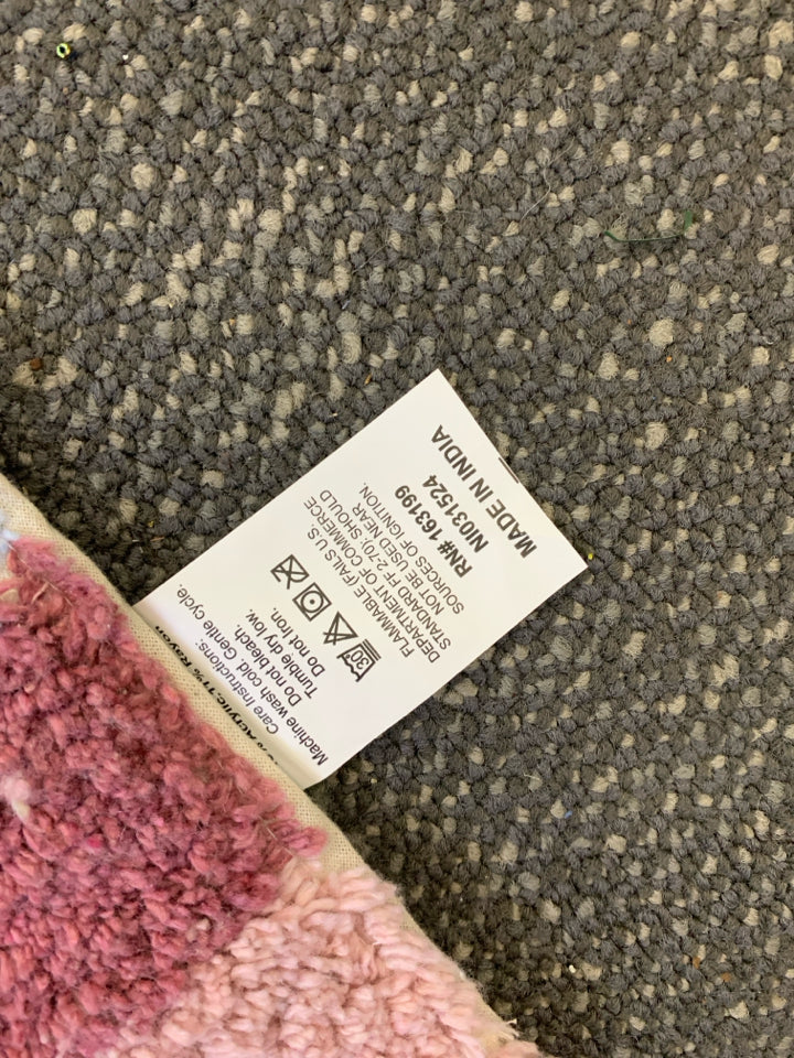 NWT CAKE RUG.