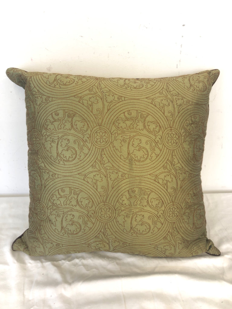 GREEN PILLOW W/  BROWN STITCHED PATTERN.