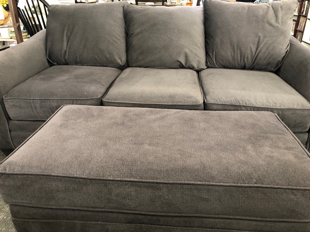 SOFT GRAY SOFA W/OTTOMAN & 3 PILLOWS.