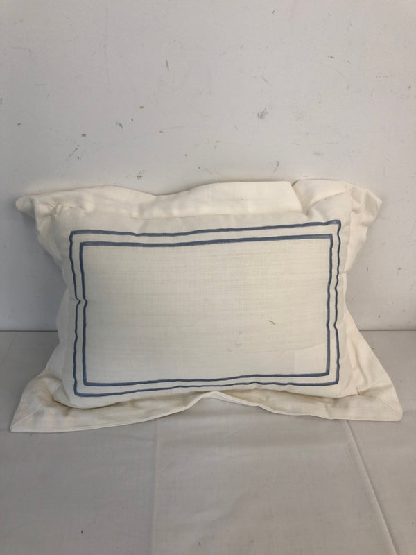 WHITE PILLOW W/ LIGHT BLUE DESIGNS.