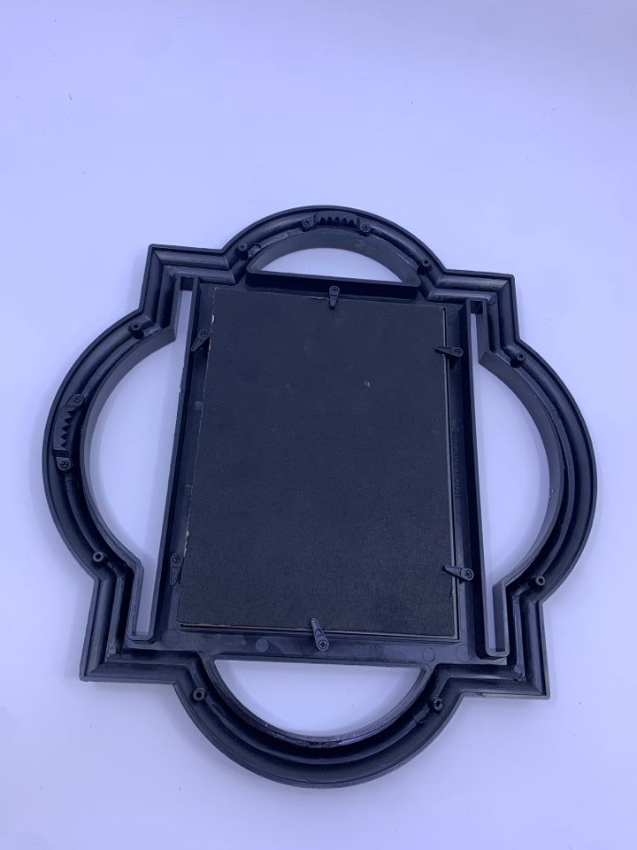 BLACK SCROLL FRAME MIRROR.