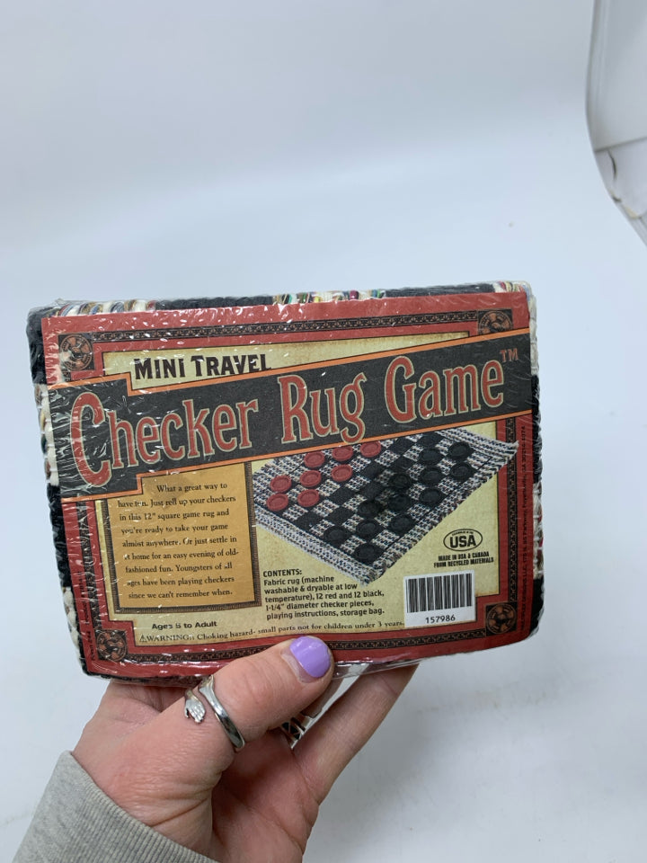 NIP CHECKERS RUG GAME.