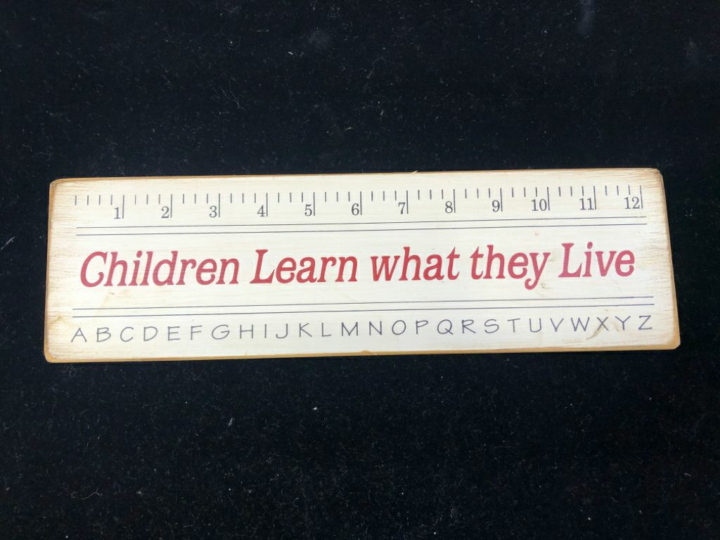 CHILDREN LEARN WHAT THEY LIVE WOODEN SIGN.