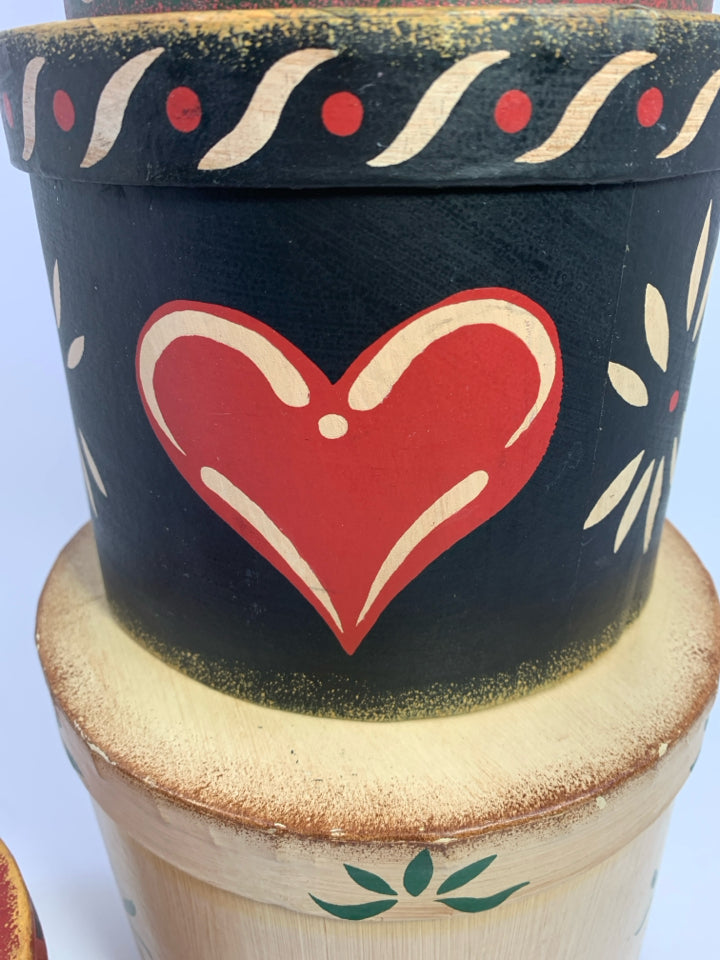 PRIMITIVE 4PC NESTING CYLINDER SHAPED BOXES.