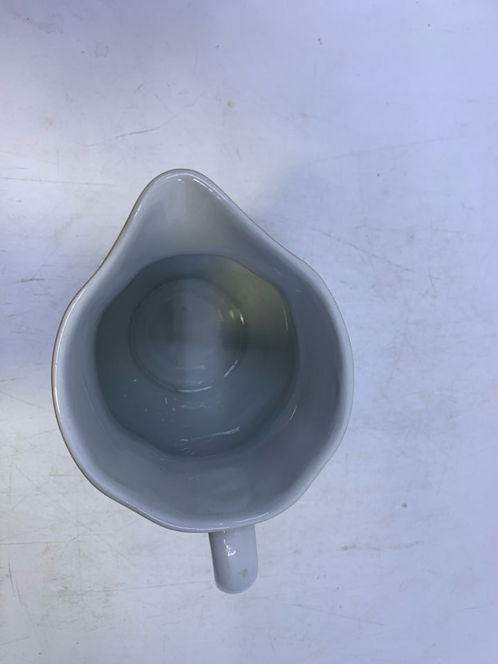 BROWN FLOWER SMALL PITCHER.