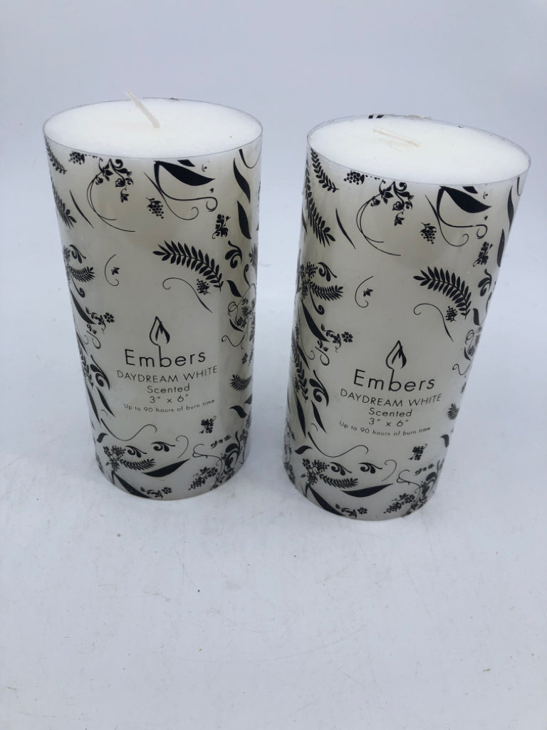 2 MEDIUM PILLAR CANDLES.