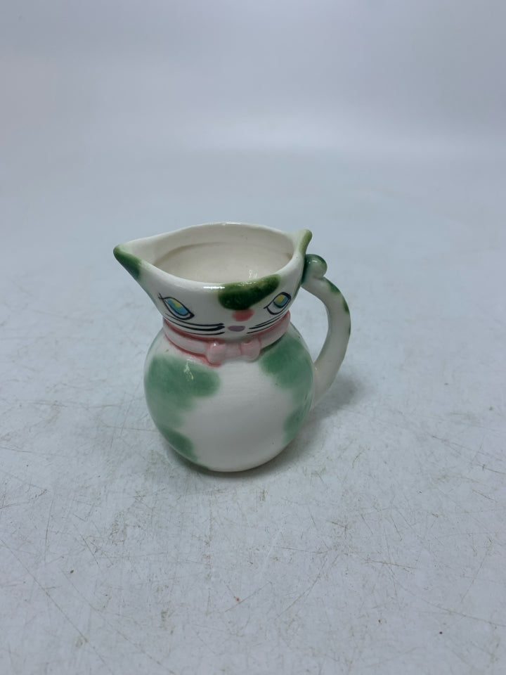 MINI CAT SHAPED CREAMER W/ GREEN DETAILS .