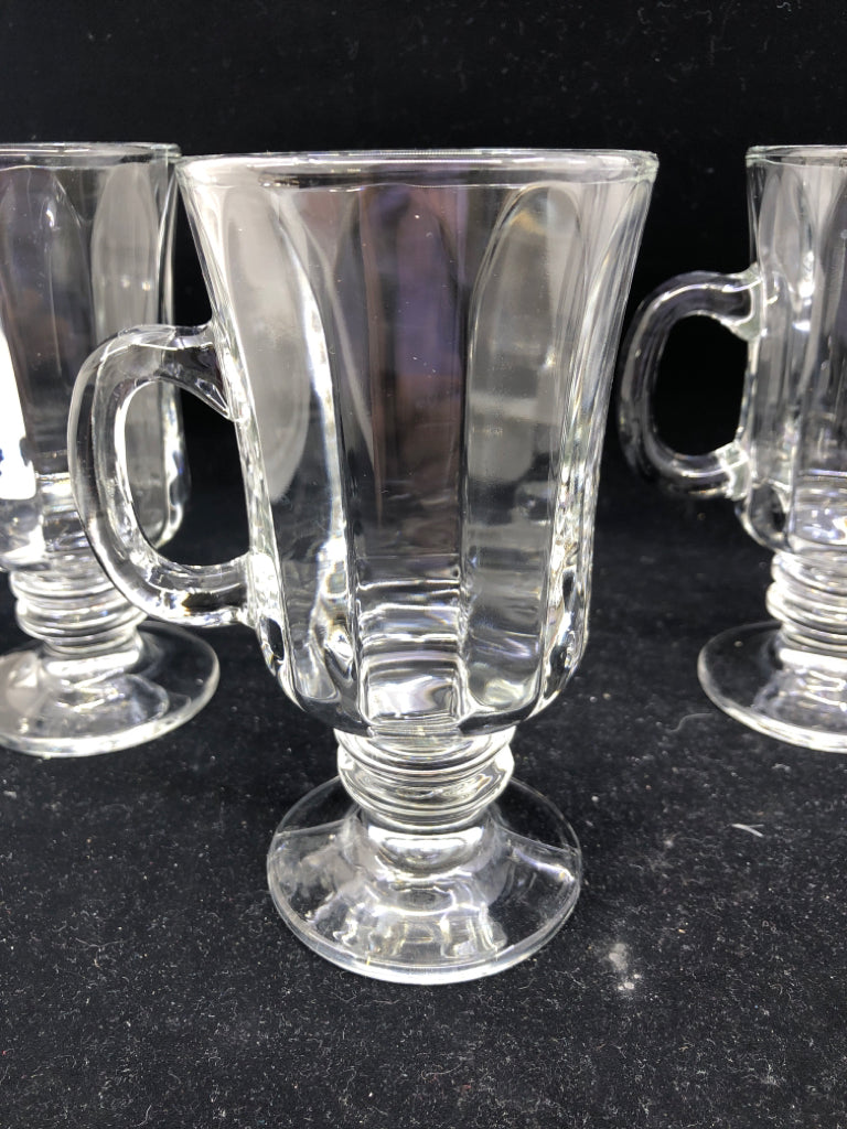 4 RIBBED FOOTED MUGS.