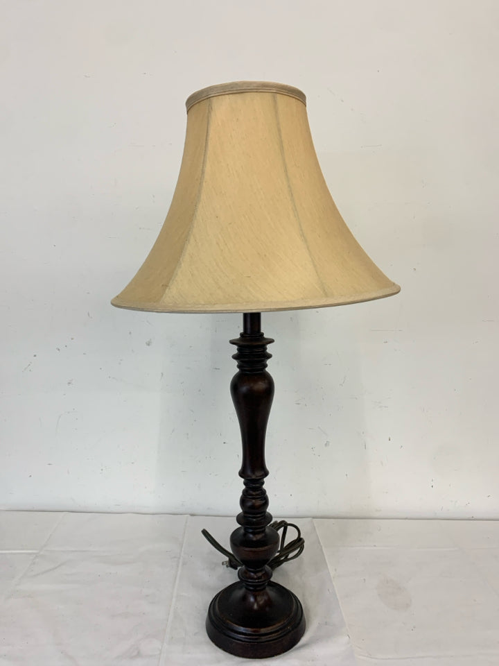 SKINNY BROWN BASE LAMP W TAN SHADE.