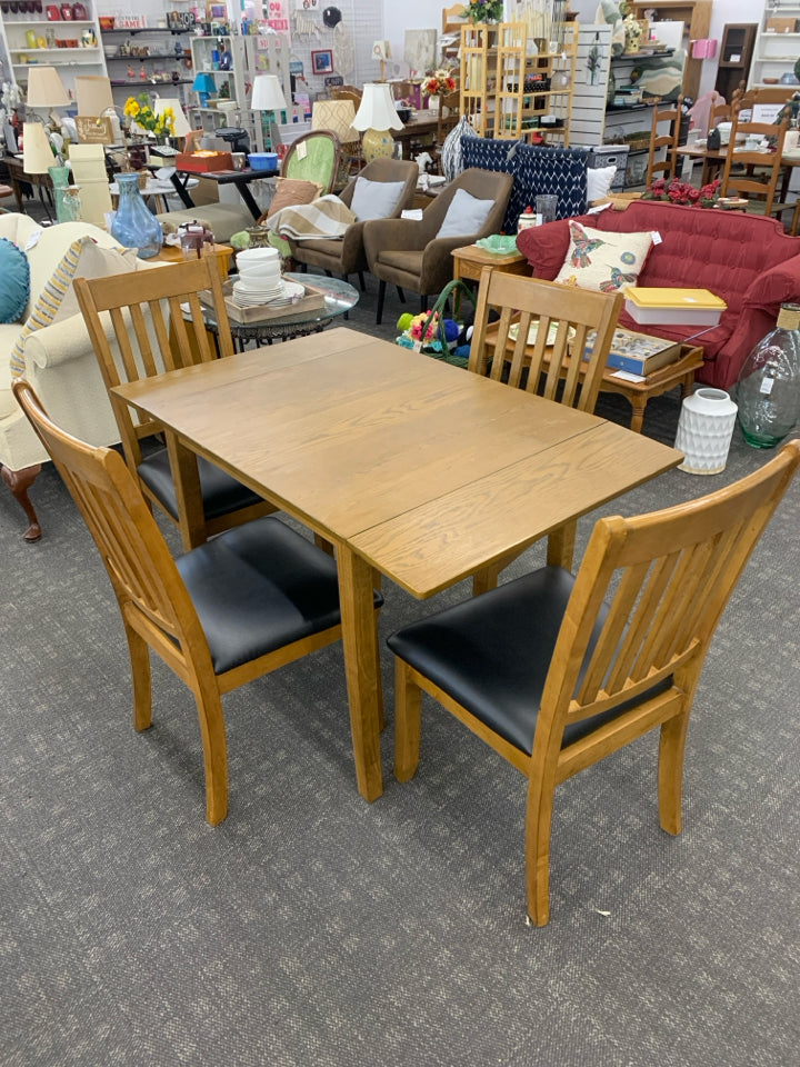 WOODEN KITCHEN TABLE W/ 4 CHAIRS.