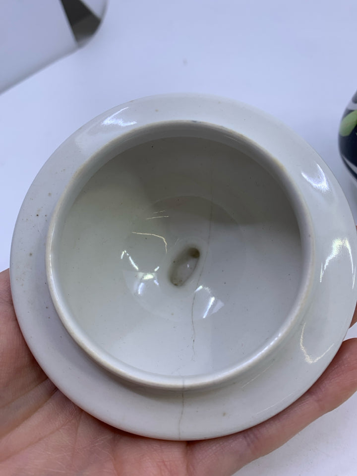 BLACK+WHITE W/PINK ORANGE PAINTED FLOWERS.