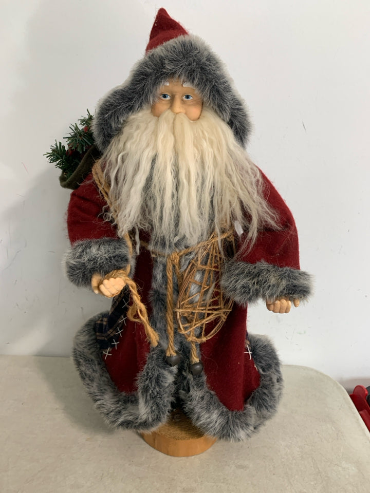 MAROON/FUR COAT STANDING SANTA W/ SNOWSHOES.