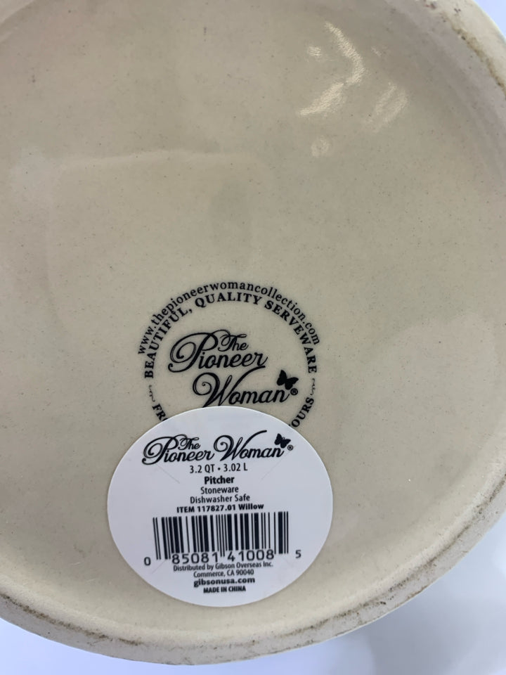 FLORAL PITCHER W/BLUE HANDLE.