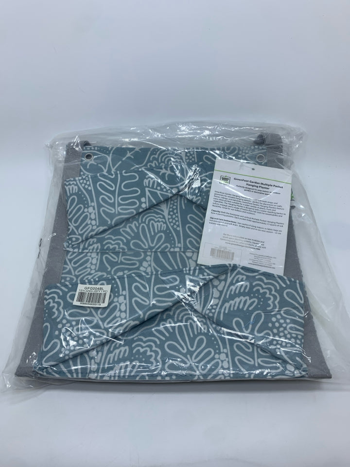 NIP BLUE LEAF HANGING POCKET PLANTER.