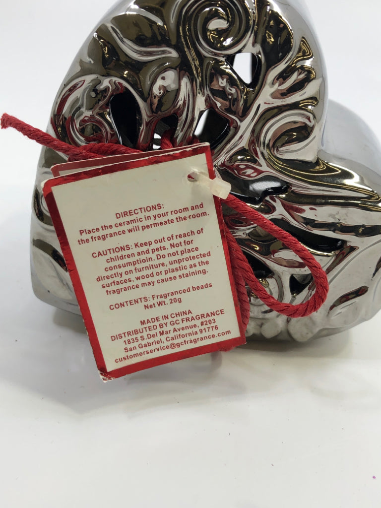 BEAUTIFUL SPRING DAY SILVER HEART FRAGRANCE SACHET.