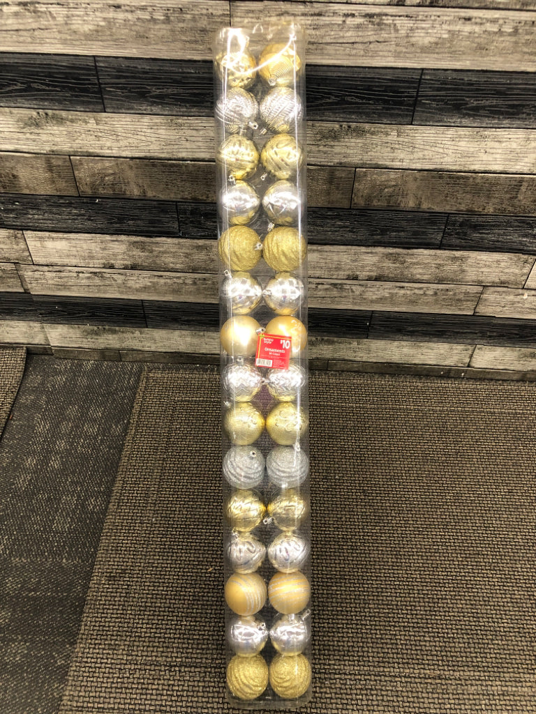 NIP SILVER GOLD PLASTIC ORNAMENTS.