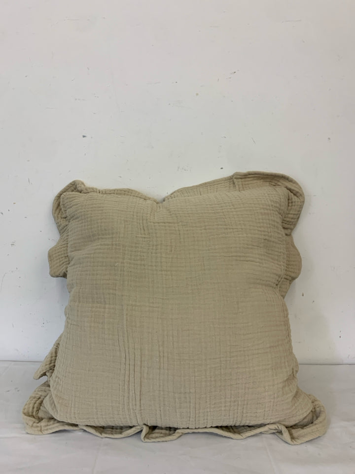 TAN RUFFLED EDGE SQUARE PILLOW.