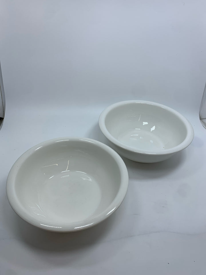 4 CERAMIC NESTING BOWLS.