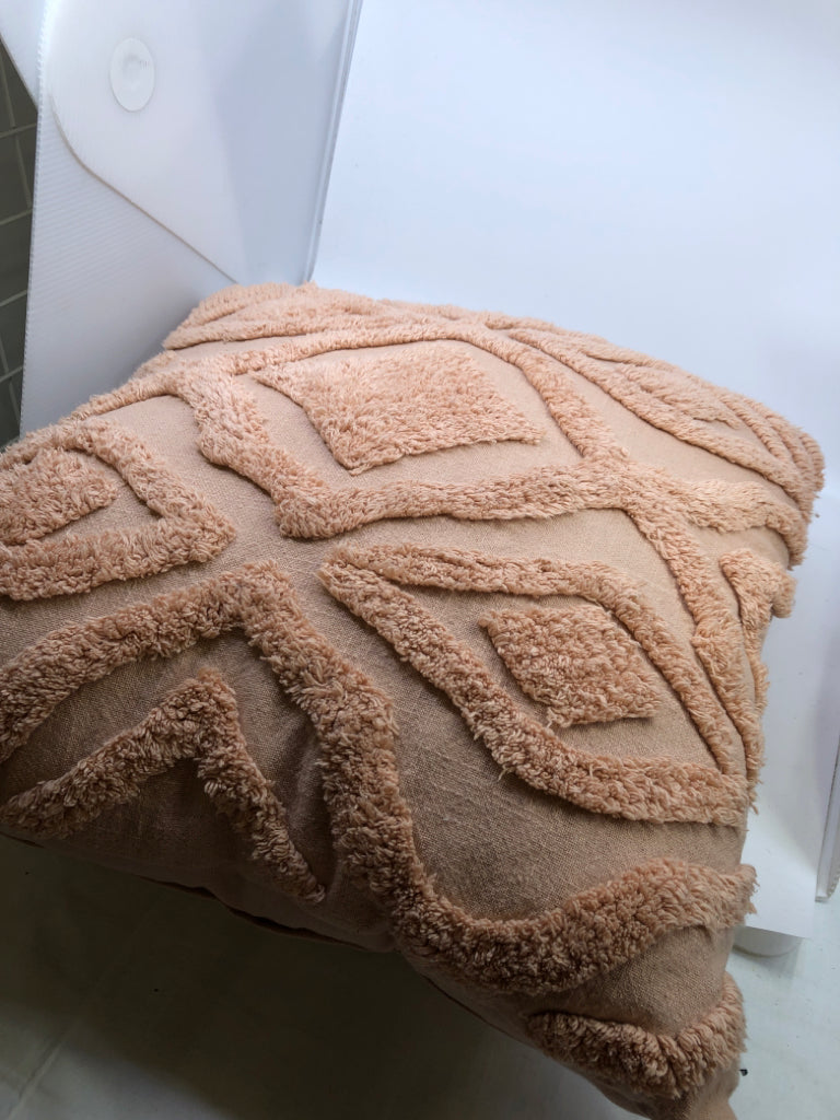 LARGE PINK TEXTURED PILLOW.