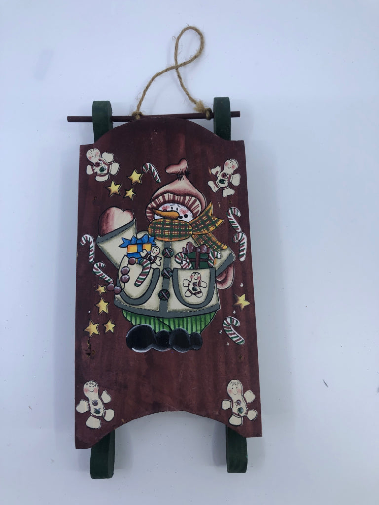 RED/GREEN SNOWMAN HANGING SLED.