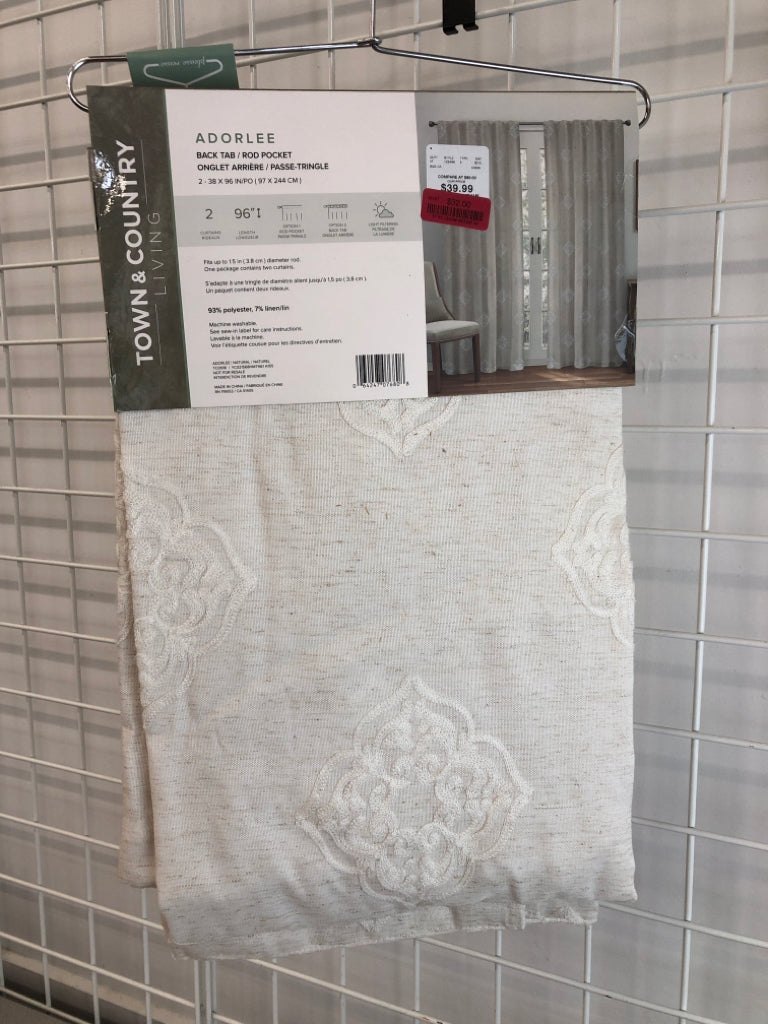 NIP 2PK CREAM BACK TAB CURTAINS.