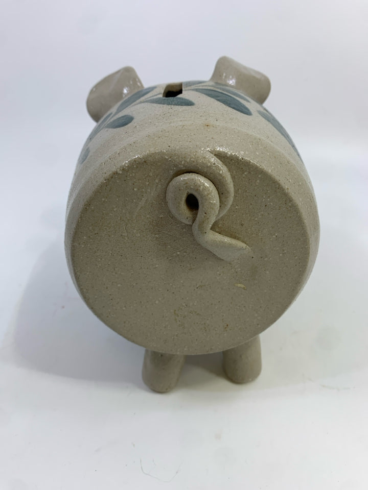 STONEWARE PIGGY BANK W/CORK SNOUT & PAINTED LEAVES.