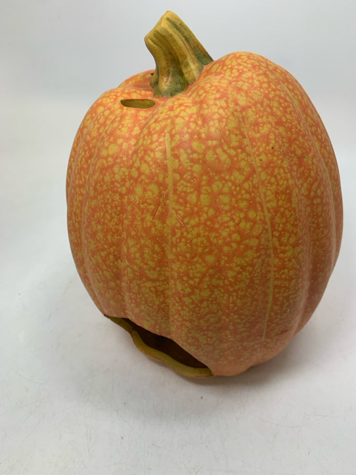 SPECKLED CERAMIC JACKO LANTERN CUTOUT CANDLE HOLDER.
