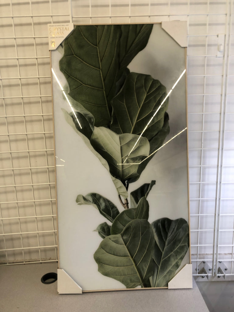 LARGE LEAF PHOTO IN LIGHT WOOD FRAME.
